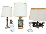 three lamps that are sitting next to each other on a table