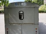 an image of a camper trailer parked in a parking lot