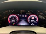 the dashboard of a car with a digital display on it