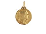 a close up of a gold coin with a woman ' s face on it