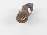 a close up of a small metal object on a white surface