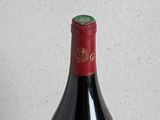 a bottle of wine that is sitting on a table