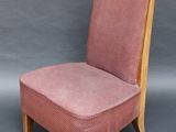 an image of a chair with a pink upholstered seat and wooden legs