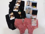 three pairs of underwear that are sitting on a table