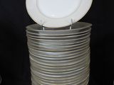 several plates stacked on top of each other on a black background