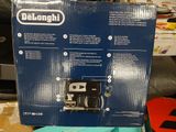 a box with a camera inside of it on a table