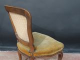 an image of a chair that is sitting on a carpet