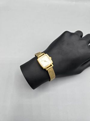 TISSOT 1853 (Suisse) Montre bracelet de dame en métal doré. …