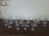 a lot of wine glasses sitting on a table
