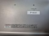 a laptop that has a sticker on the back of it