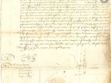 un vieux document écrit posé sur une table