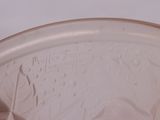a close up view of a glass bowl with a lid