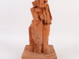 statue représentant un homme et une femme à cheval, sur fond blanc