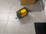 a box that is sitting on the floor next to a stove