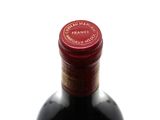 a bottle of wine that is sitting on a table