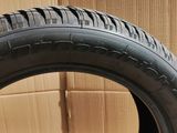 a close up of a tire with a sticker on the side of it