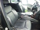 a picture of the inside of a car with leather seats