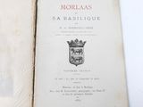 an old book with a picture of a crown on it
