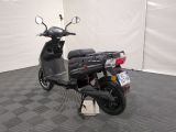 a scooter that is parked in a room