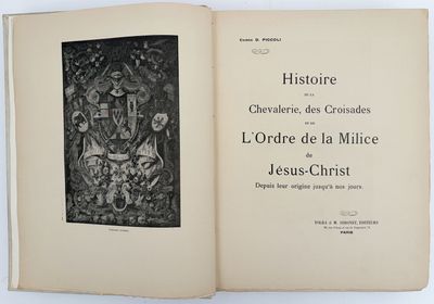 an open book with a black and white drawing of a man on a horse