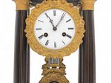 a clock that is sitting on top of a table