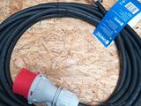 a black hose with a red and white plug attached to it