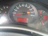 a close up of a car dashboard with a speedometer