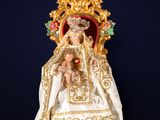 an image of a statue of a woman holding a child
