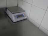 a scale sitting on a counter in a kitchen