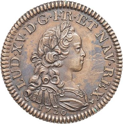 a close up of a coin with a woman ' s head on it