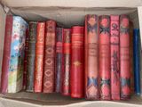 a box full of books that are sitting on a table