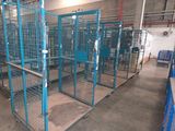 many cages that are in a large room