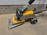 a close up of a machine that is sitting on the ground