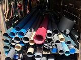 a lot of pipes stacked on top of each other