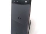 a close up of a cell phone on a stand