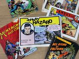 many comic books on the table on the table