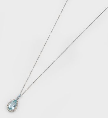 a white gold necklace with a blue topaz stone and diamonds
