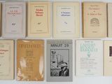 a lot of books that are sitting on a table