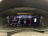 the dashboard of a car with a digital display on it