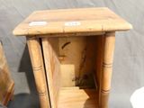 a small wooden table with a drawer underneath it