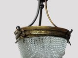 an image of a chandelier hanging from a ceiling
