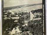 black and white photograph of an aerial view of a small town