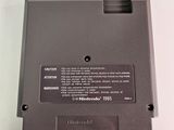 the back side of a laptop computer with a battery on it