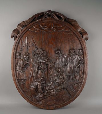 a wooden plaque depicting a scene in a medieval setting