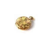 an image of a gold pocket watch on a white surface