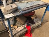 an image of a workbench with tools on top of it