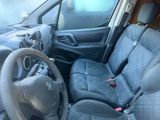 a car that has a steering wheel and a dashboard