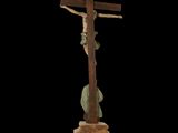 wooden crucifix with jesus on the cross on a black background
