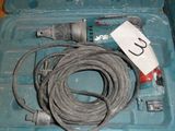 a cord in a tool box with a cord in it