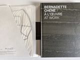 a book that has a picture of a feather on it